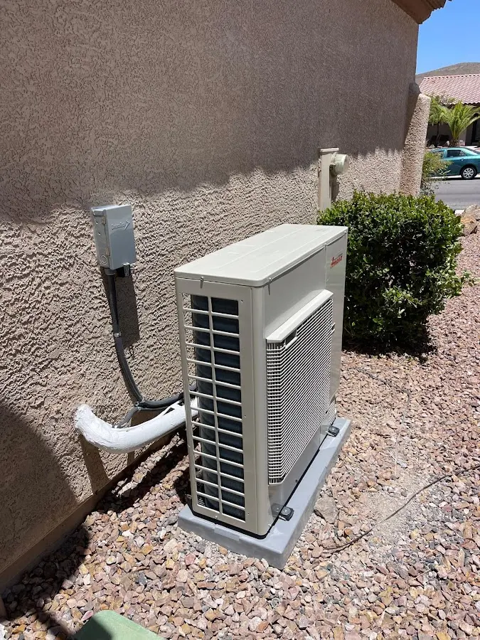 Residential air conditioning condenser unit in Dorr